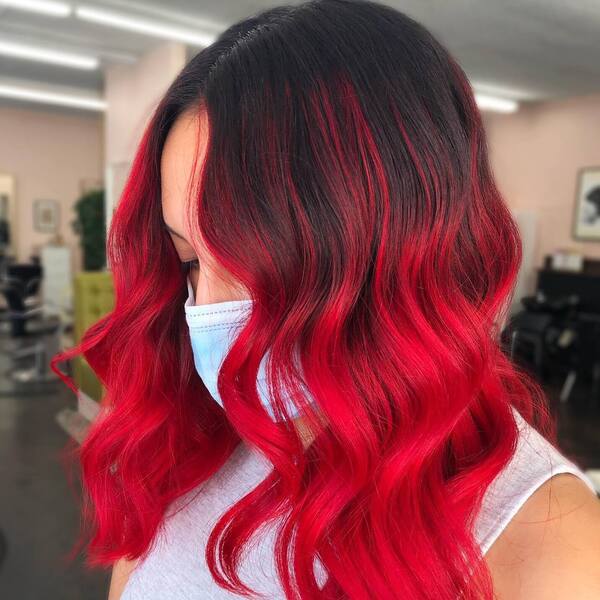 Black to Bright Red Ombre- a woman wearing a face mask