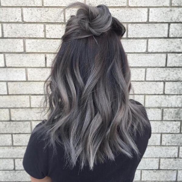 Brunette Hair Color Ideas with Gray Tips- a woman wearing a black t-shirt