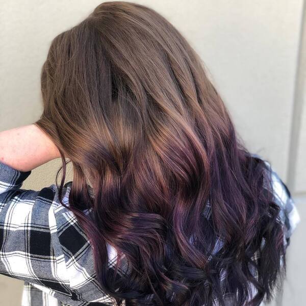 Brunette with Brown to Purple Balayage- a woman wearing a checkered long sleeve