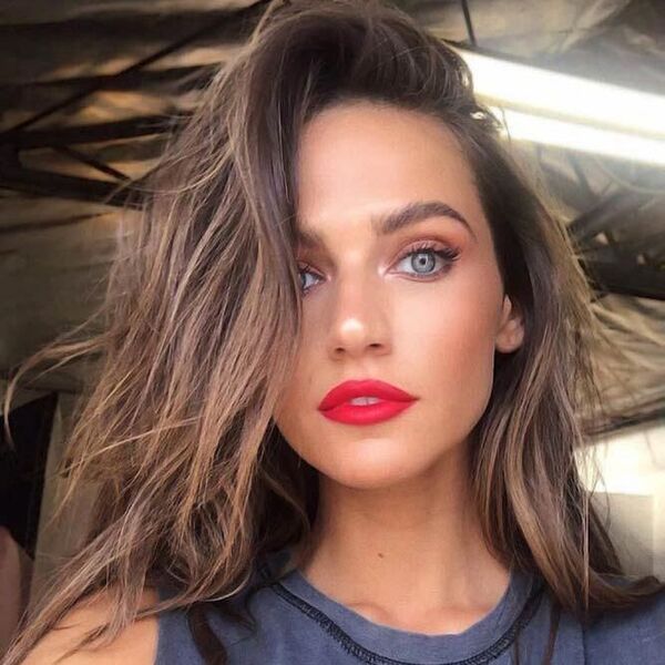 Hair Color Ideas for Brunettes with Ashy Highlights- a woman with red lips