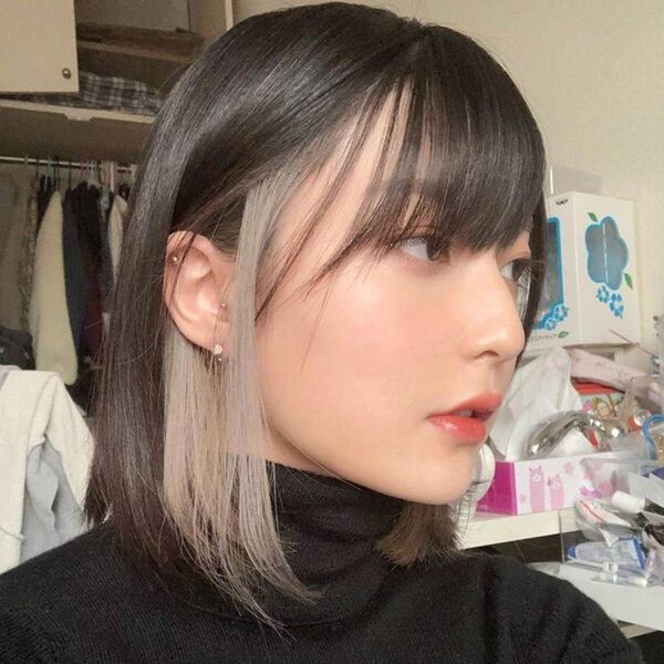 Hidden Two-Tone Hair Color Ideas for Dark Hair- a woman wearing a black turtle neck
