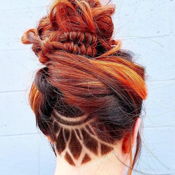 Intricate Nape Undercut with Messy and Braided Bun- a woman facing a wall