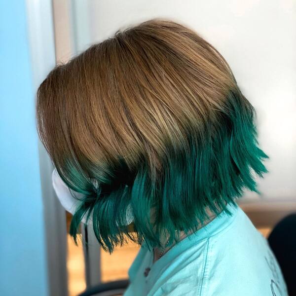 Light Brown to Emerald Green Reverse Ombre- a woman wearing a white face mask
