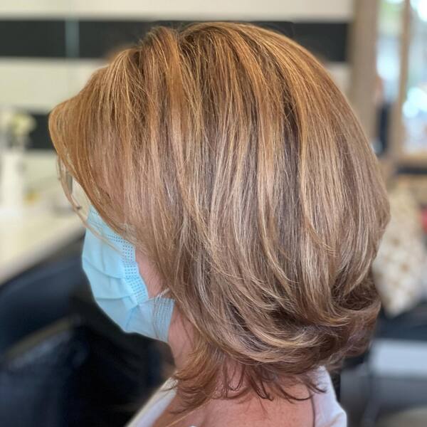 Light Milk Chocolate Hair Color Ideas for Short Hair- a woman wearing a face mask