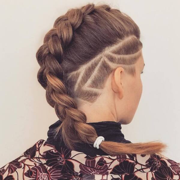 Nape Undercut with Long Braid- a woman wearing a floral jacket