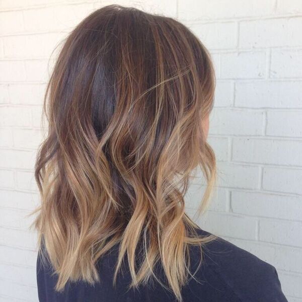 Ombre Hair Color Ideas for Brunettes- a woman wearing a black shirt