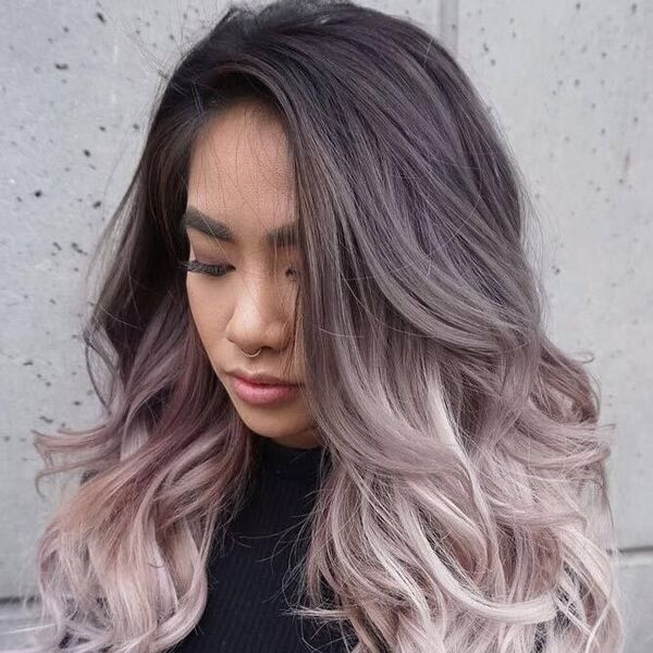 Ombre Hair Color Ideas for Dark Hairs- a woman wearing a black turtle neck