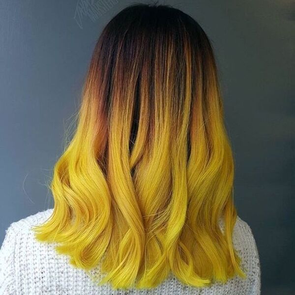 The Sunflower Ombre- a woman wearing a white sweater