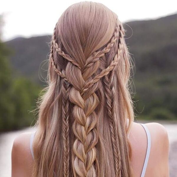 The Vikings-Inspired Braids- a woman wearing a white camisole
