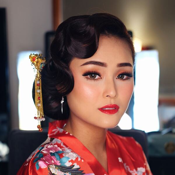 1920's Inspirations- an Asian woman wearing a red kimono dress