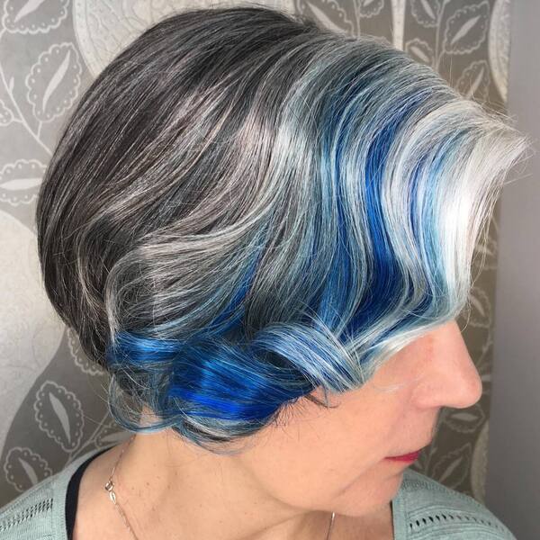 Blue with Gray- a woman with gray hair wearing a blouse