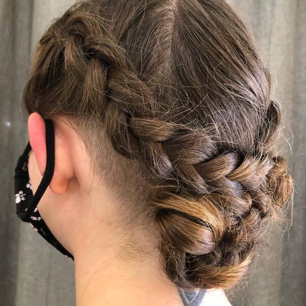 Braided Bridal Updo- a woman wearing a black face mask