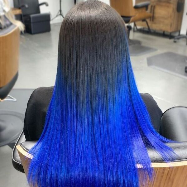 Bright Blue Ombre for Long Hair- a woman wearing a black blouse