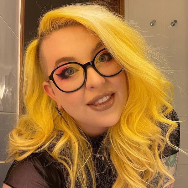 Bright Hair for a Dark Souls- a woman wearing an eyeglasses