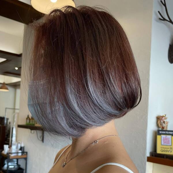 Brown Hair with Silver Grey Ombre- an Asian wearing a white camisole
