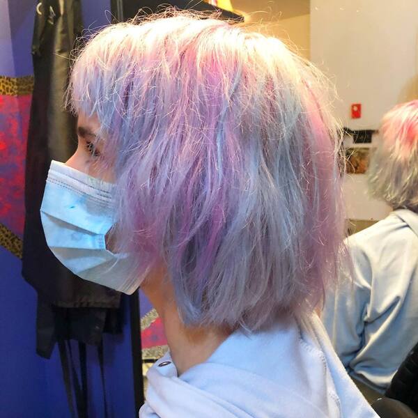 Cotton Candy Anime Inspired Hairstyles- a woman wearing a face mask