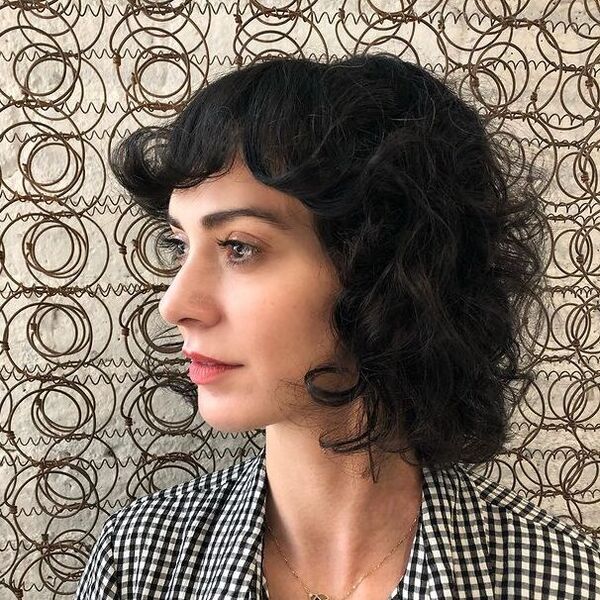 Curled Bangs Hairstyles for Square Faces - a woman in a side view