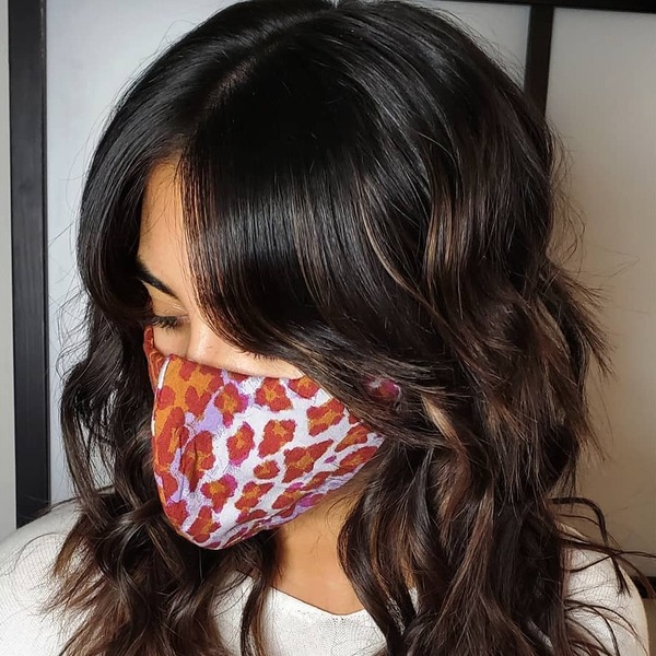 Dark Colors Hairstyle for Thin Hair- a woman wearing a face mask