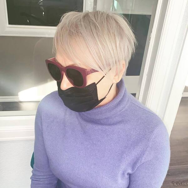 Edgy Hairstyles for All Ages- a woman wearing a black face mask