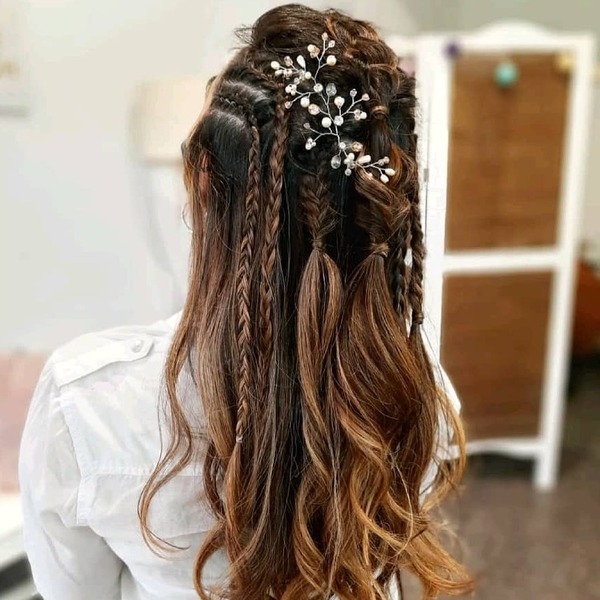 Elvish Inspired Hairstyle- a woman wearing a white blouse