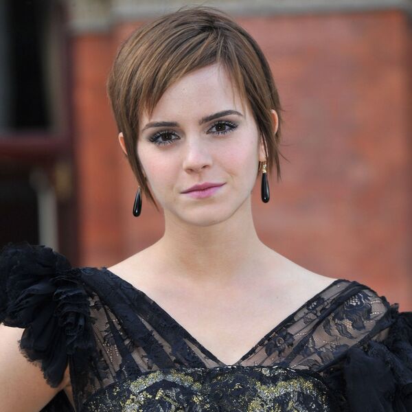 Emma Watson's Pixie Cut- Emma Watson wearing a black dress