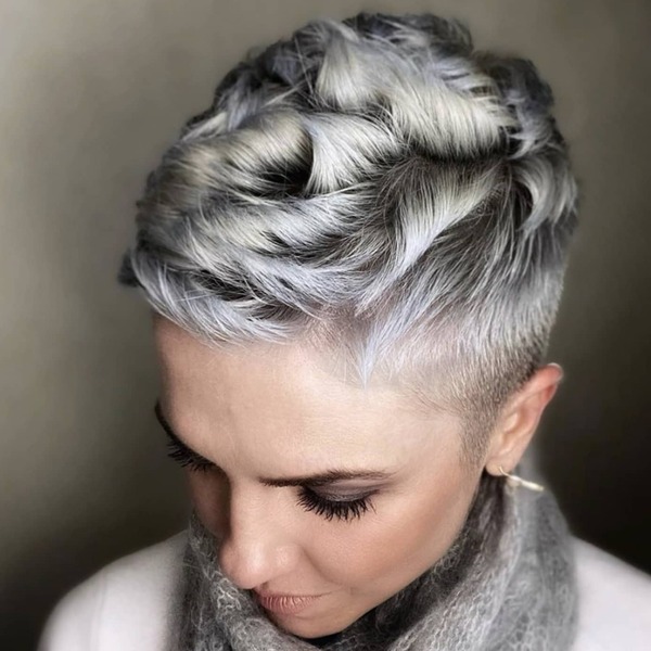 Extra Textured Pixie Cut- a woman wearing a gray scarf