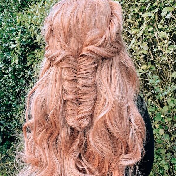 Fishtail Half Up Half Down Hairstyles for Long Hair- a woman wearing a black sweater dress