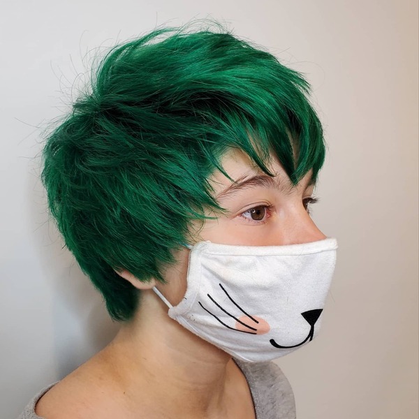 Forest Spirit Inspired Hairstyle- a woman wearing a white face mask