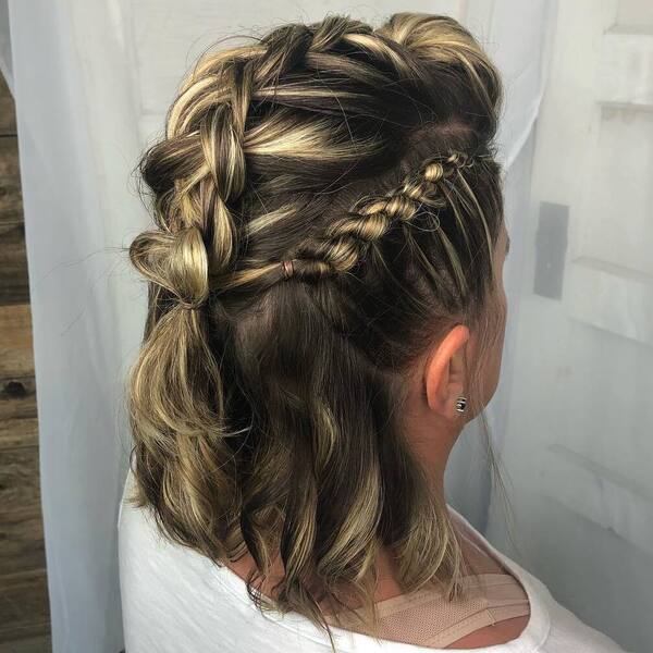 French Braids for Medium Hair- a woman wearing a white blouse