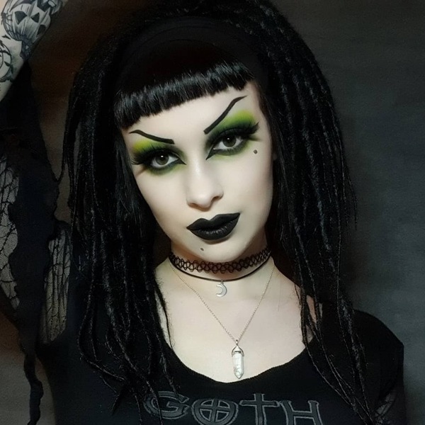 Goth Dreadlocks- a woman wearing a black shirt