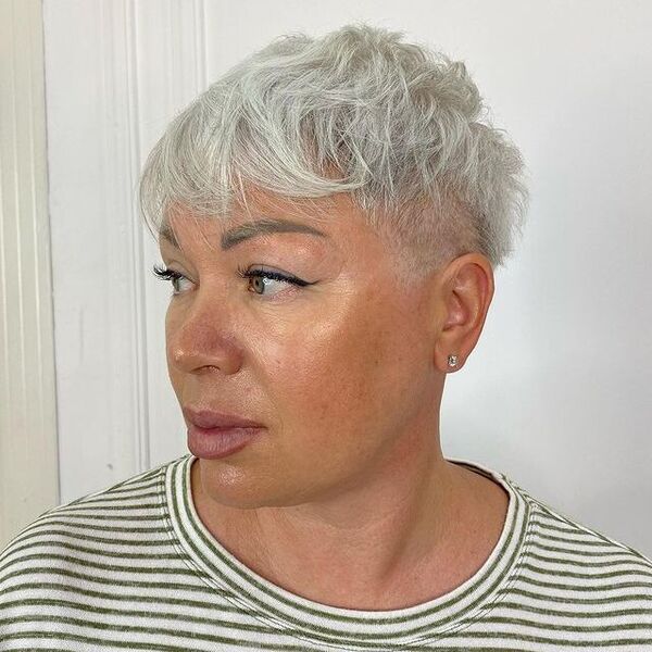 Long Messy Pixie Cuts - a woman in a side view