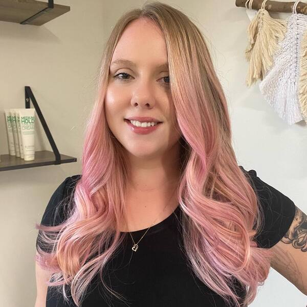 Mermaid Wavy Pink Hair Color- a woman wearing a black t-shirt