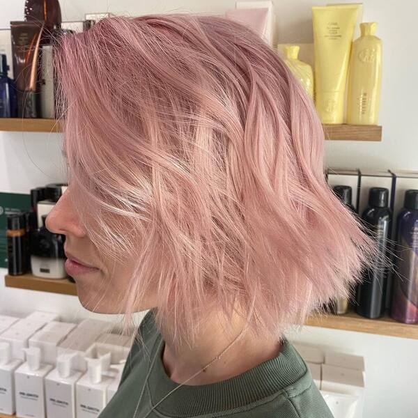 Messy Bob Pink Hairstyles- a woman wearing an olive green t-shirt