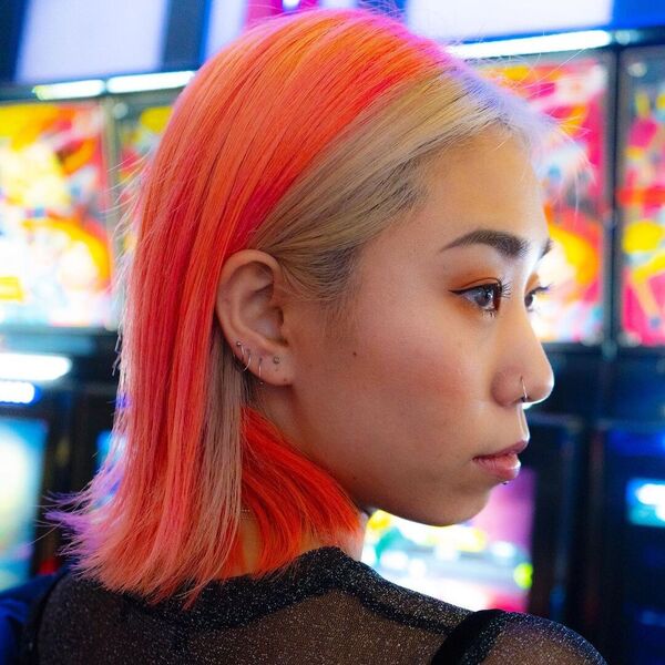 Neon Orange Striped Colorful Hair- a woman wearing a black camisole dress