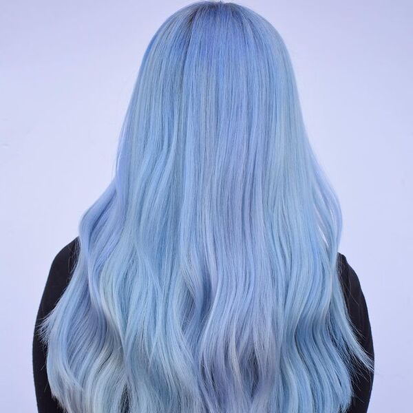 Pastel Blue Hair with Lavender Undertones- a woman wearing a black jacket