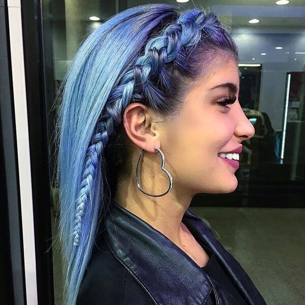 Pastel Blue and Purple Hair with Black Shadow Roots- a woman wearing a black leather jacket