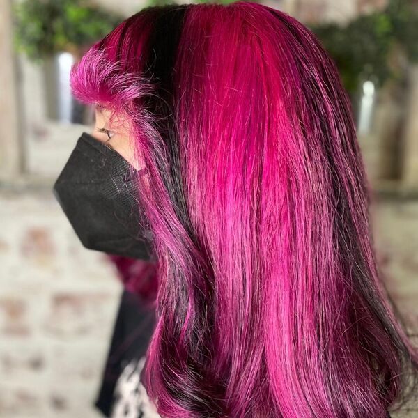 Pink Vibe Hairstyles- a woman wearing a black face mask