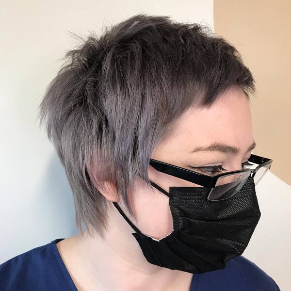 Pixie Cut Anime Inspired Hairstyles- a woman wearing a black face mask