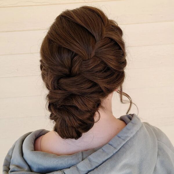 Practical and Pretty French Braid Styles- a woman wearing a gray hoodie jacket