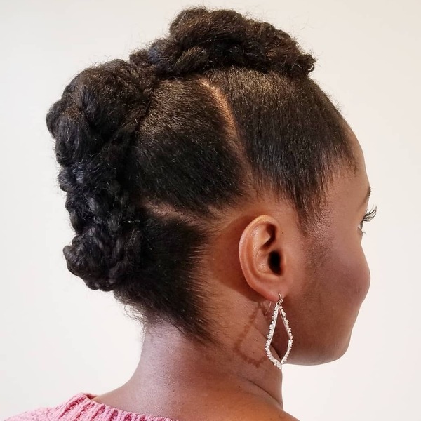 Protective Updos for Medium Hair- a woman wearing a pink sweater