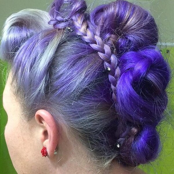 Purple and Blue Braided Up-do Hairstyle- a woman wearing a red earrings