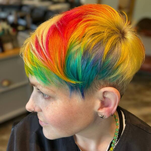 Rainbow Hair Pixie Cut- a woman wearing a black t-shirt
