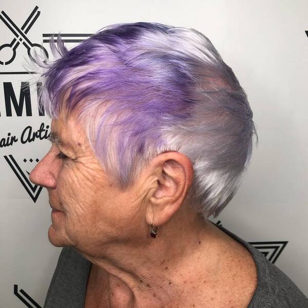 Reverse Purple Ombre Pixie- a woman over 60 a gray blouse