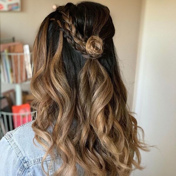 Roses Half Up Half Down Hairstyles- a woman wearing a denim jacket