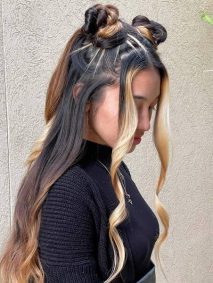 Sailormoon Inspired Hairstyle- a woman wearing a black sweater