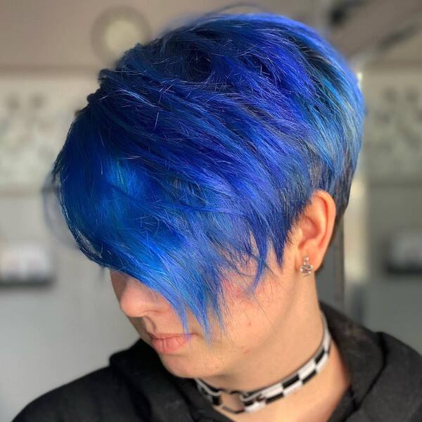 Sea Blue Edgy Hairstyles- a woman wearing a black hoodie jacket