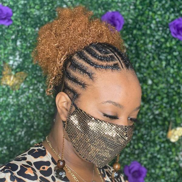 Short Braids with Blowout Bun Updo Hair- a woman wearing a face mask