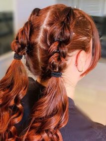 Short Loose French Braids with Curly Pigtails- a woman wearing a black t-shirt