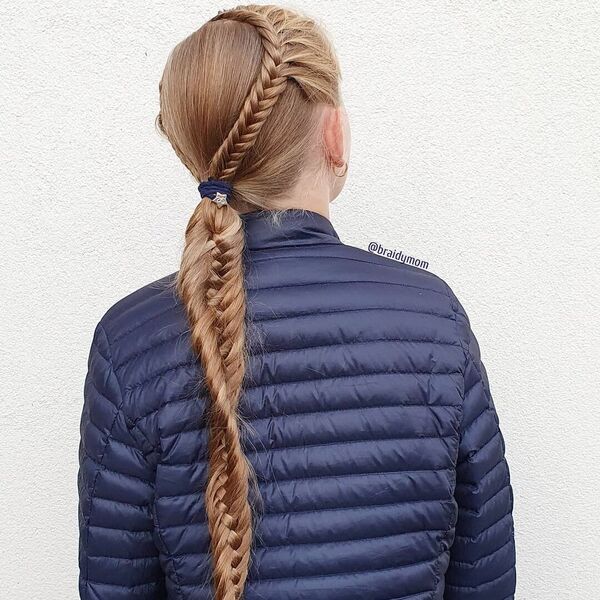 Stylish Back to School Hairstyle- a woman wearing a dark blue jacket
