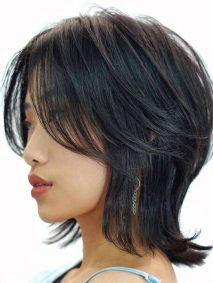 Textured Shoulder-length Hair for Asian- a woman wearing a blue camisole